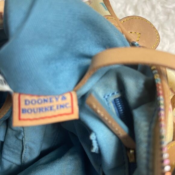 Dooney & Bourke PVC Multi color logo Bagette shoulder bag. Tan leather trims - Picture 11 of 16